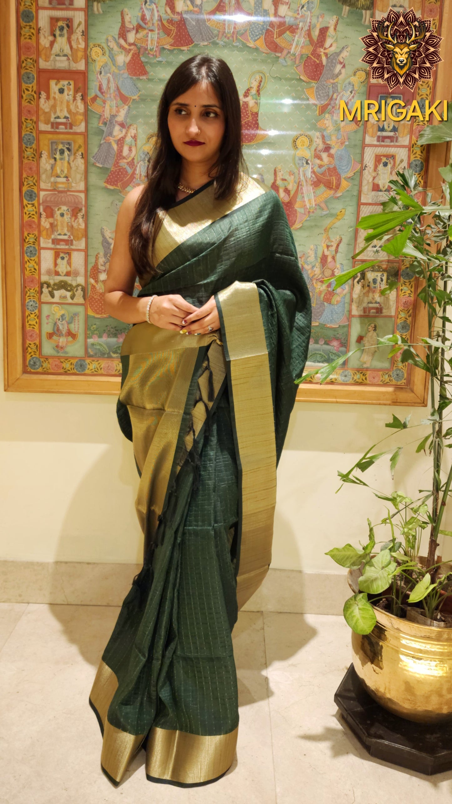 Dark green color Georgette Banarasi Butti Saree with Vertical lines & plain Zari border