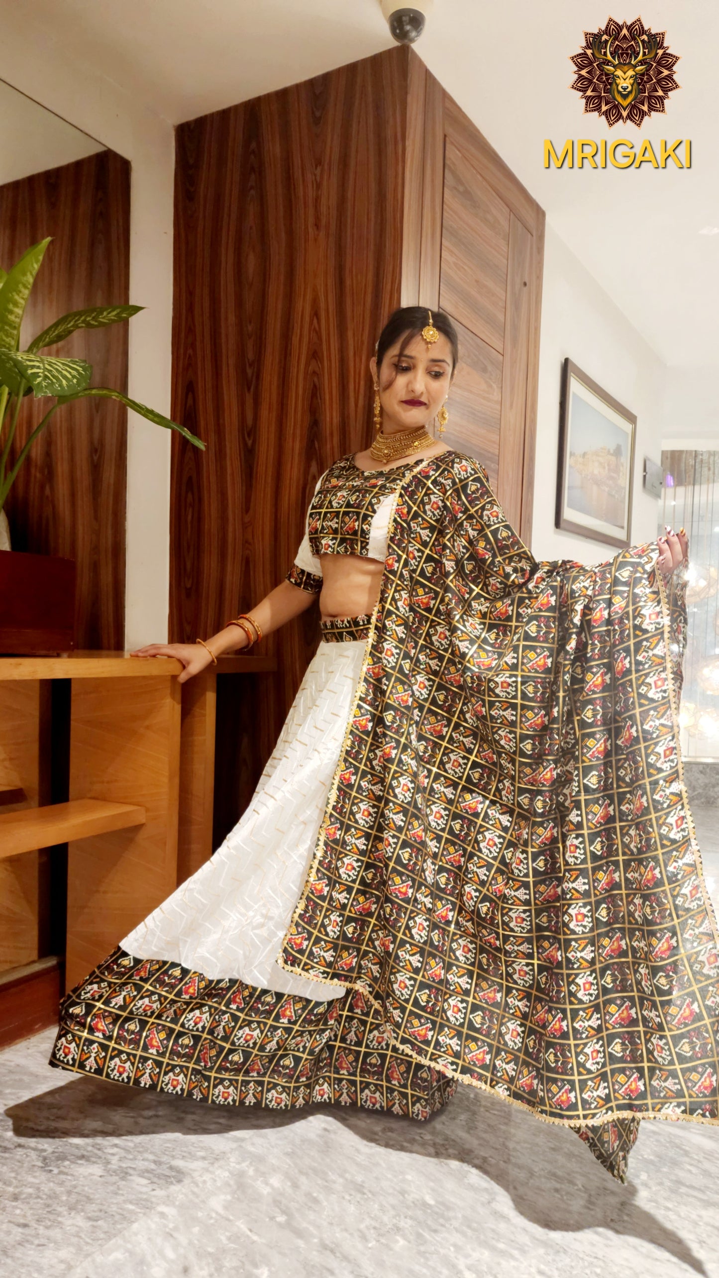 Pure Rayon Cotton Gujrati Patola print patch work border Lahenga Choli in Rama green & White contrast colors with Dupatta