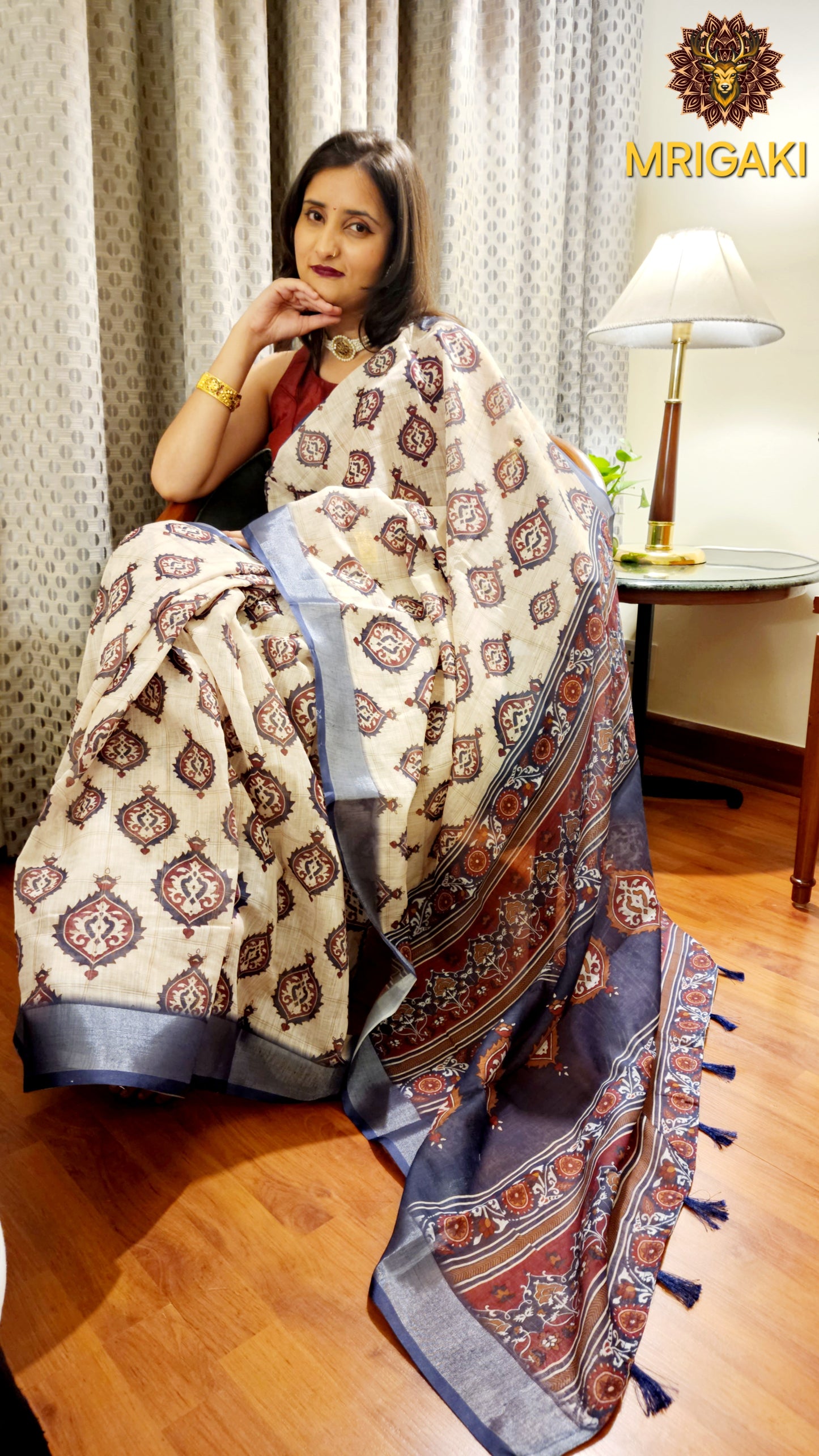 Beige Base Linen Saree with Bells design all-over, blue border with heavy digital print pallu