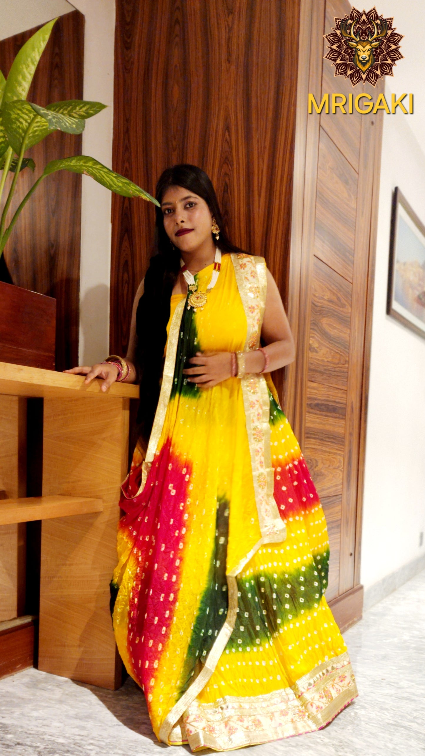 Gota patti Embellished Rajasthani Bandhani Semi-stitched Lahenga Choli in Yellow, Red & Green contrast colors