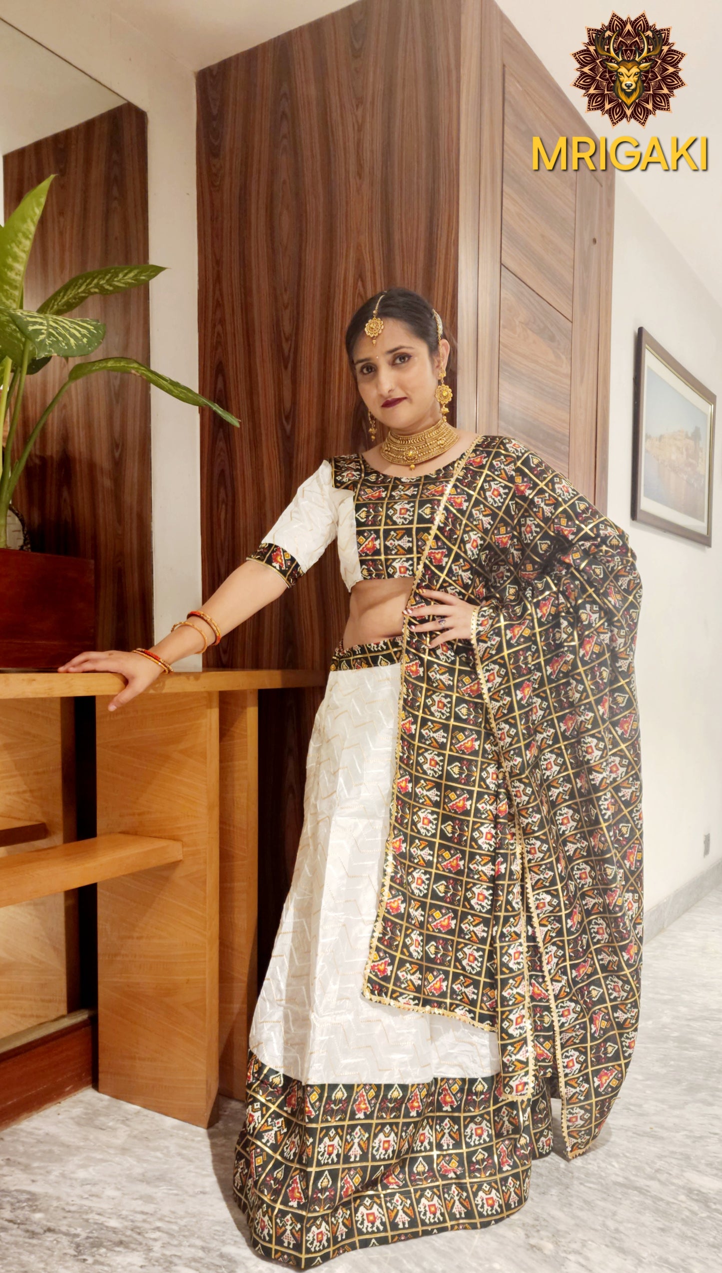 Pure Rayon Cotton Gujrati Patola print patch work border Lahenga Choli in Rama green & White contrast colors with Dupatta