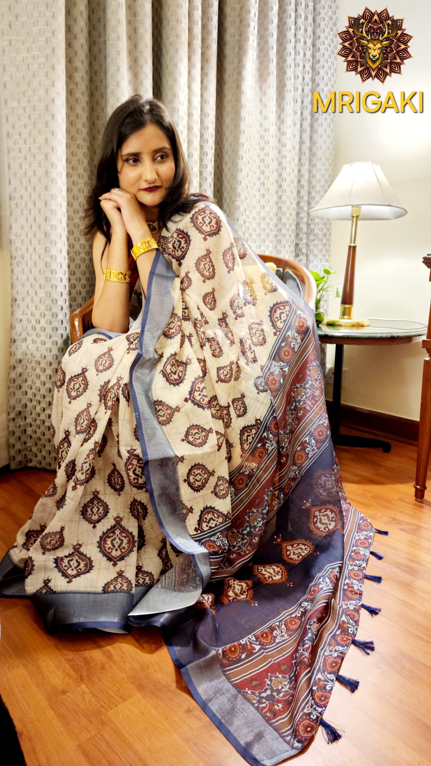 Beige Base Linen Saree with Bells design all-over, blue border with heavy digital print pallu