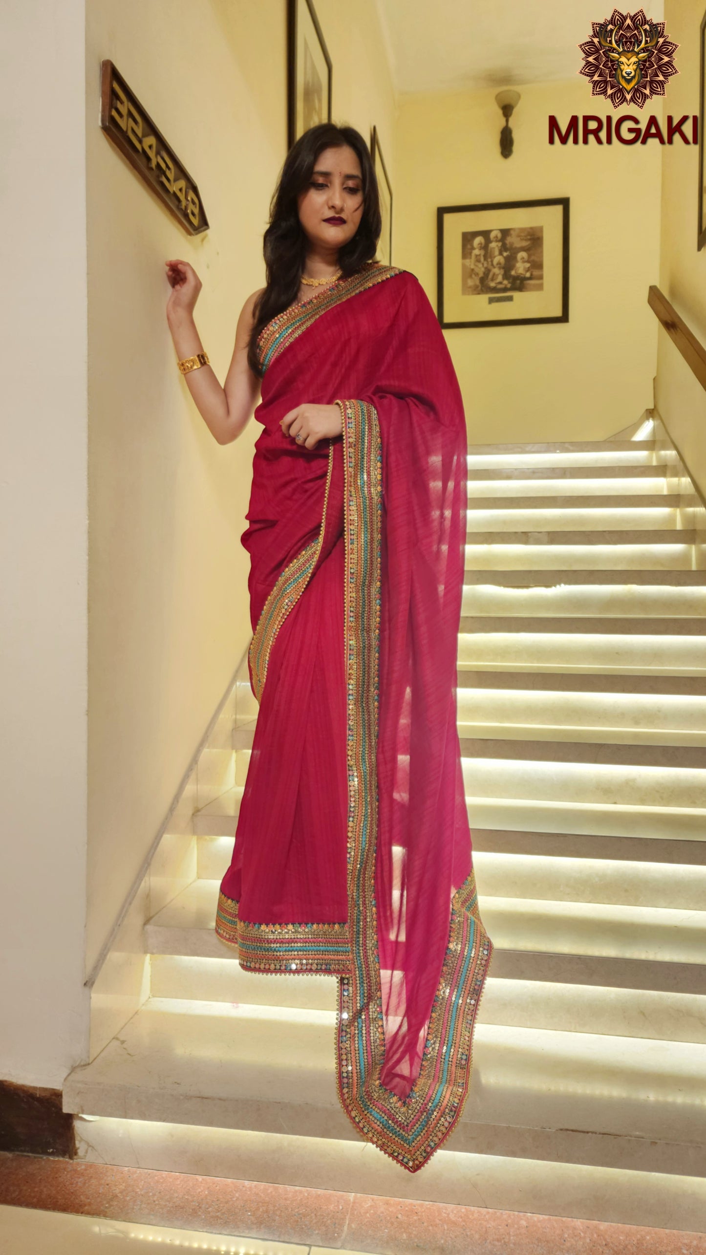Pure Georgette Rani Pink Plain saree with multi-color Embroidered lining all-over borders