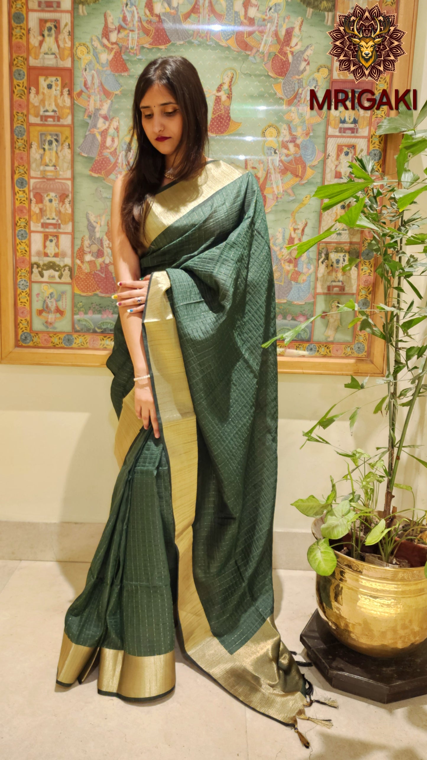 Dark green color Georgette Banarasi Butti Saree with Vertical lines & plain Zari border