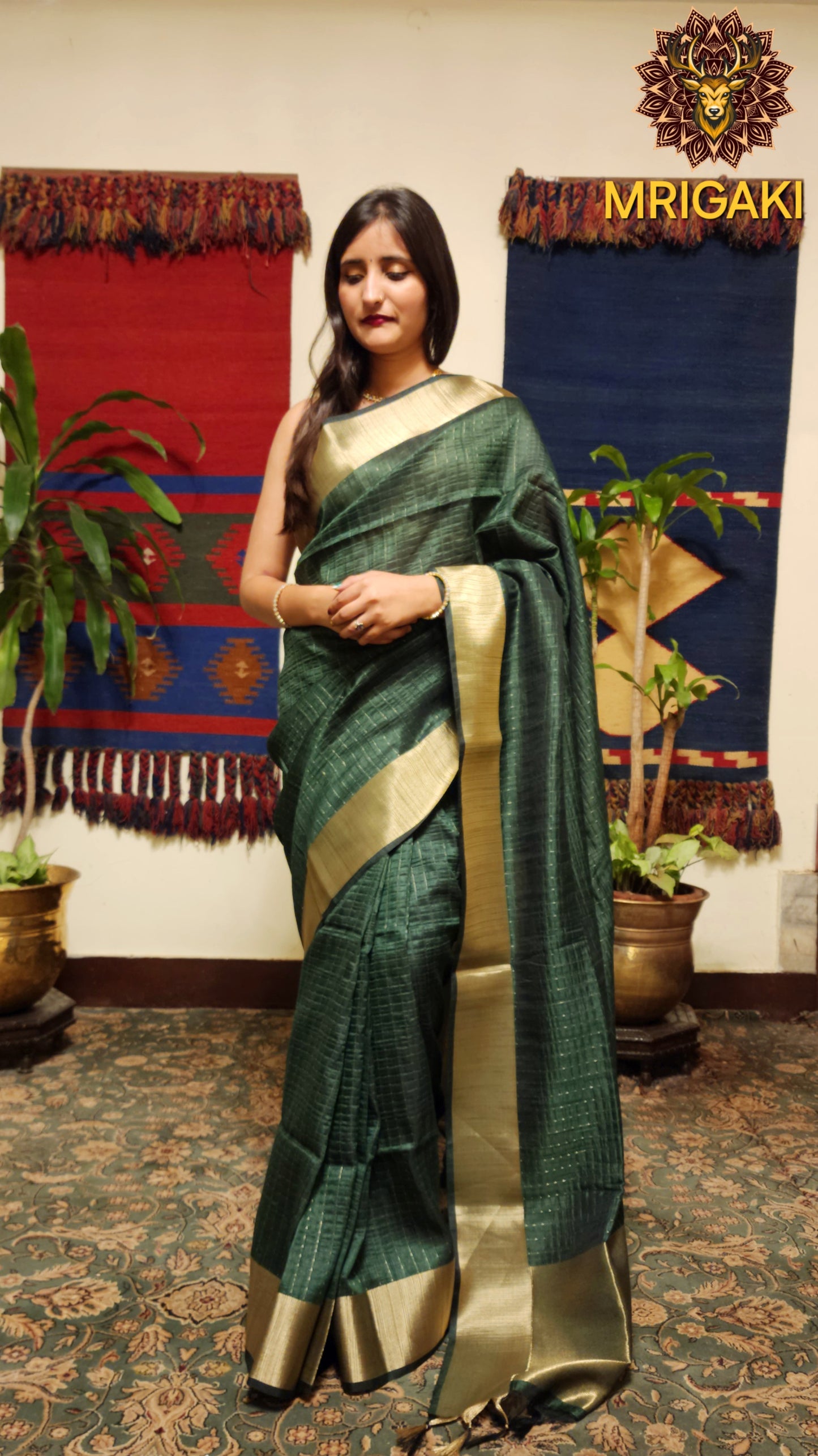 Dark green color Georgette Banarasi Butti Saree with Vertical lines & plain Zari border