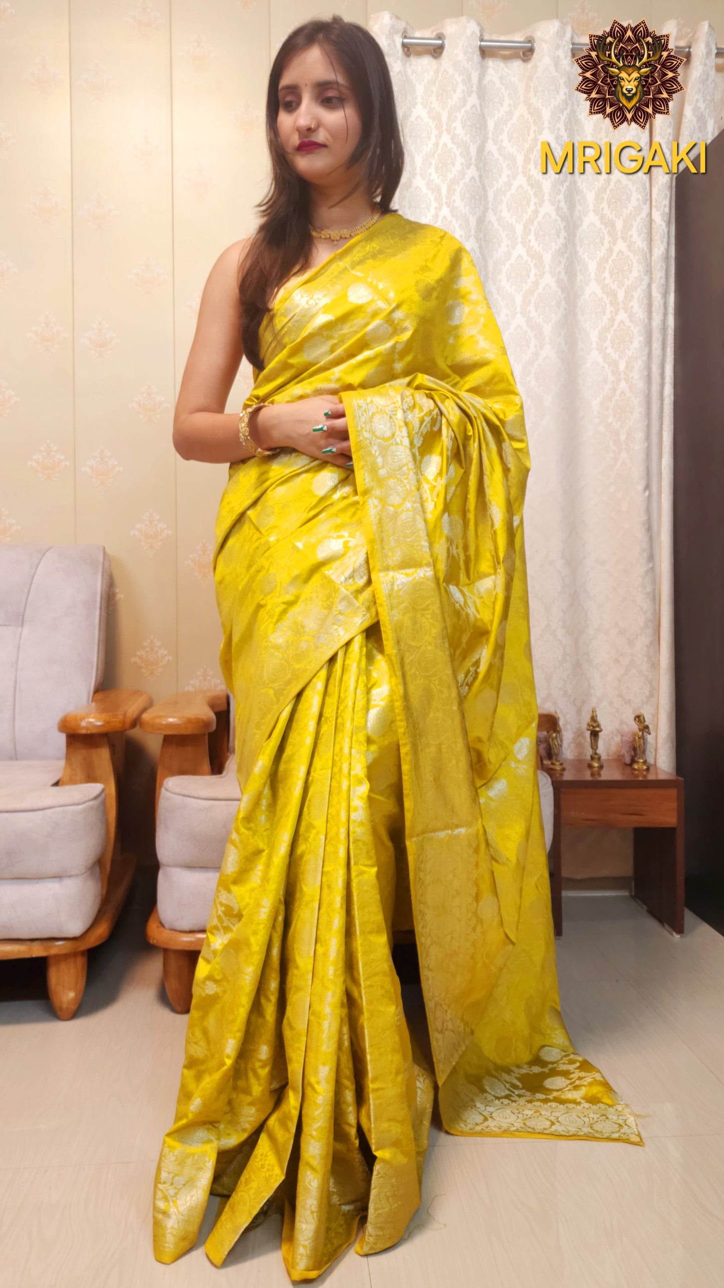 Yellow color Pure Dupion Silk Banarasi Saree with Silver Jaal all over