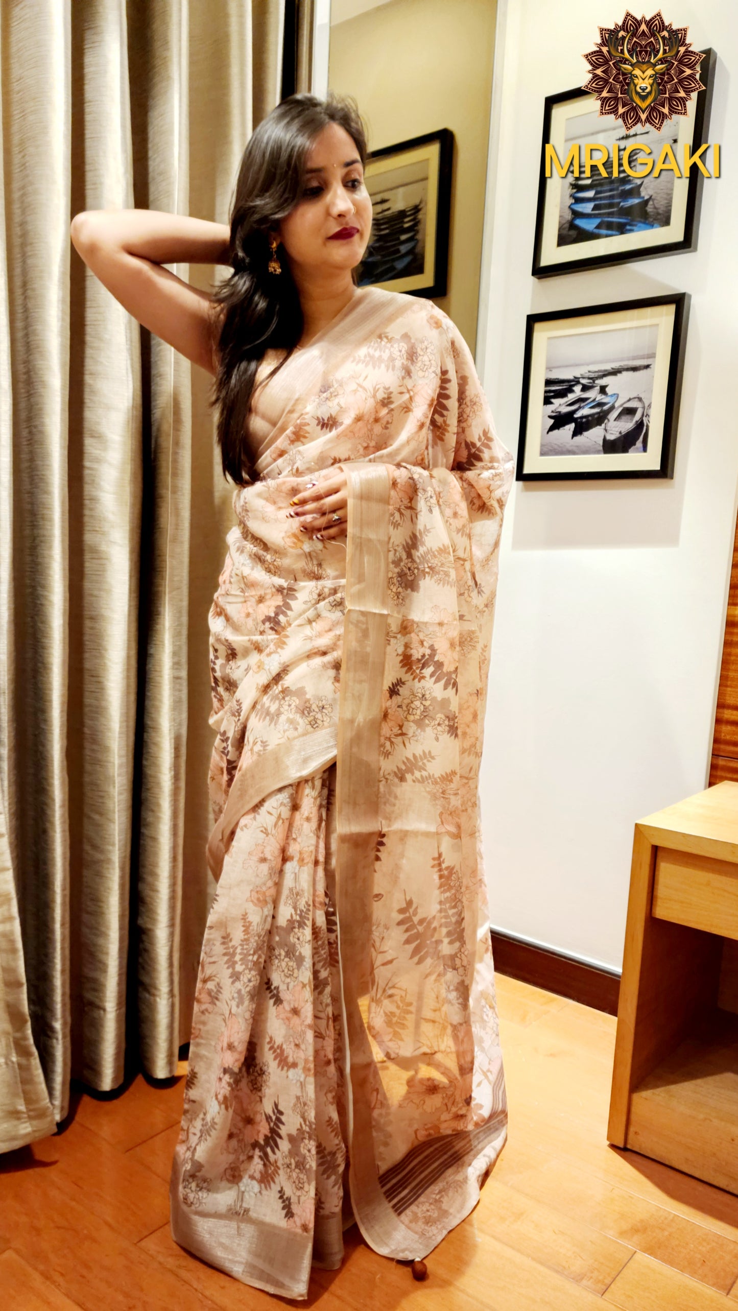 Beige Base Linen Saree with Big flowers digital design all-over, light brown border with Pom-Pom on Pallu