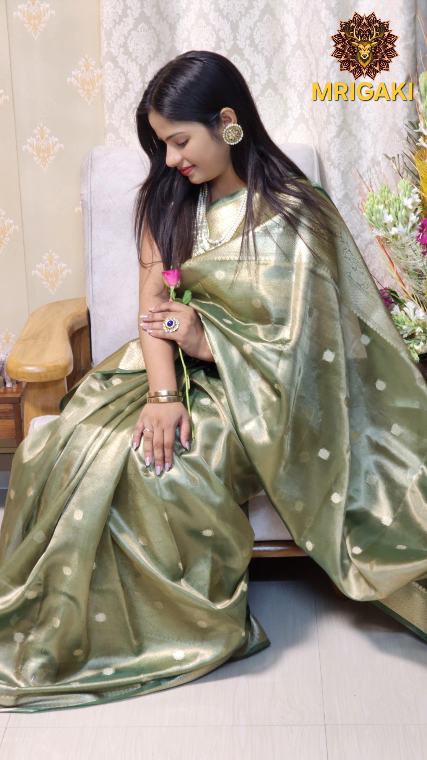 Elegant Tissue Silk Olive Green color Saree with Banarasi Zari Border