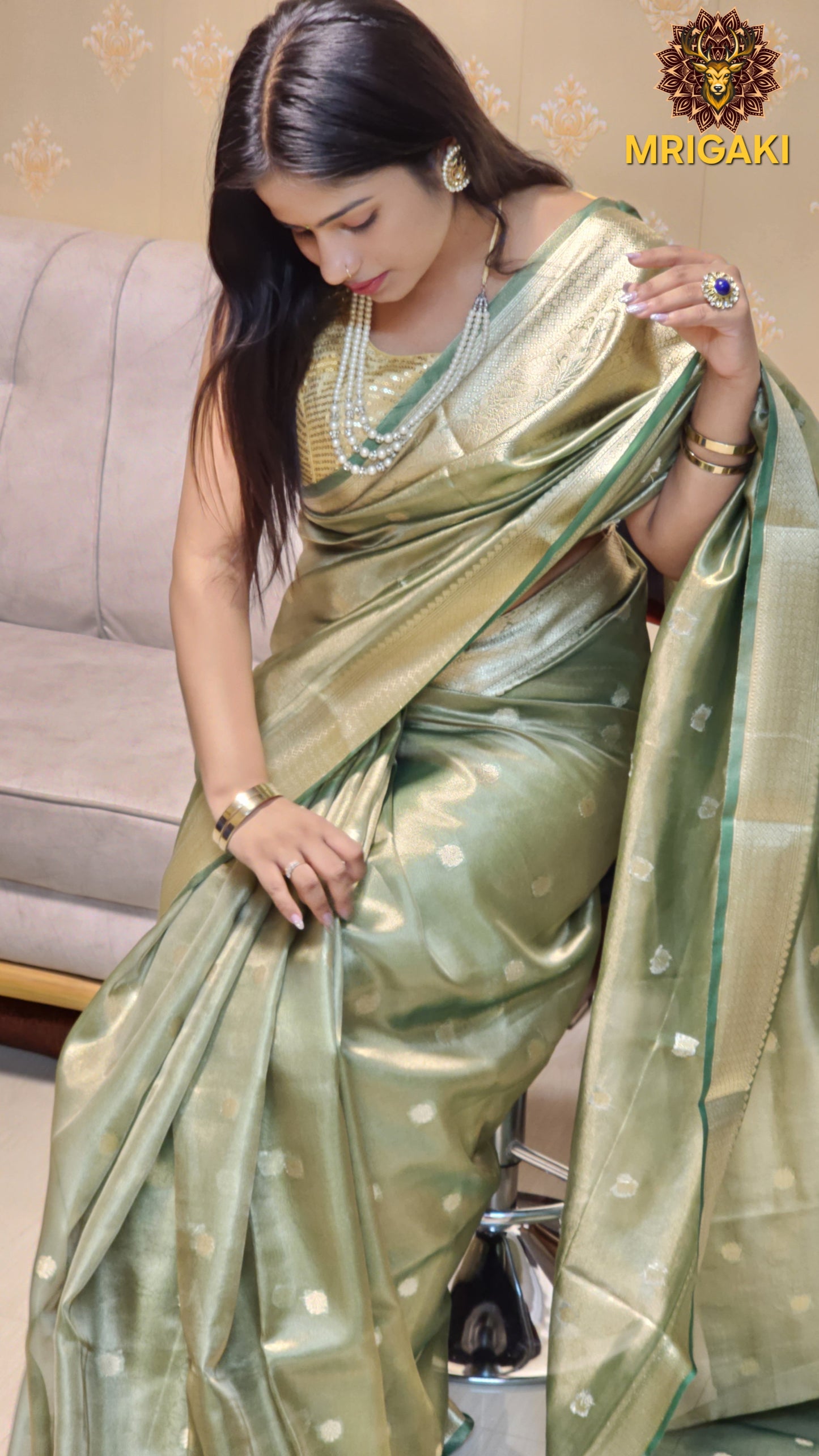 Elegant Tissue Silk Olive Green color Saree with Banarasi Zari Border