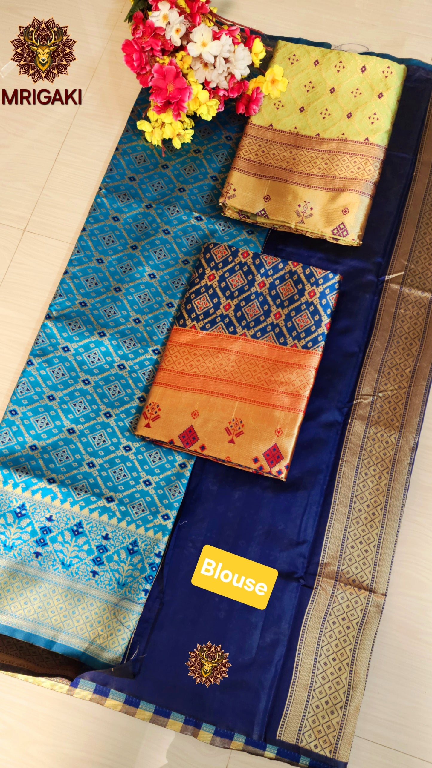 Warm Silk  Saree in Turquoise Blue color with geometrical print all over & Patola Print Pallu