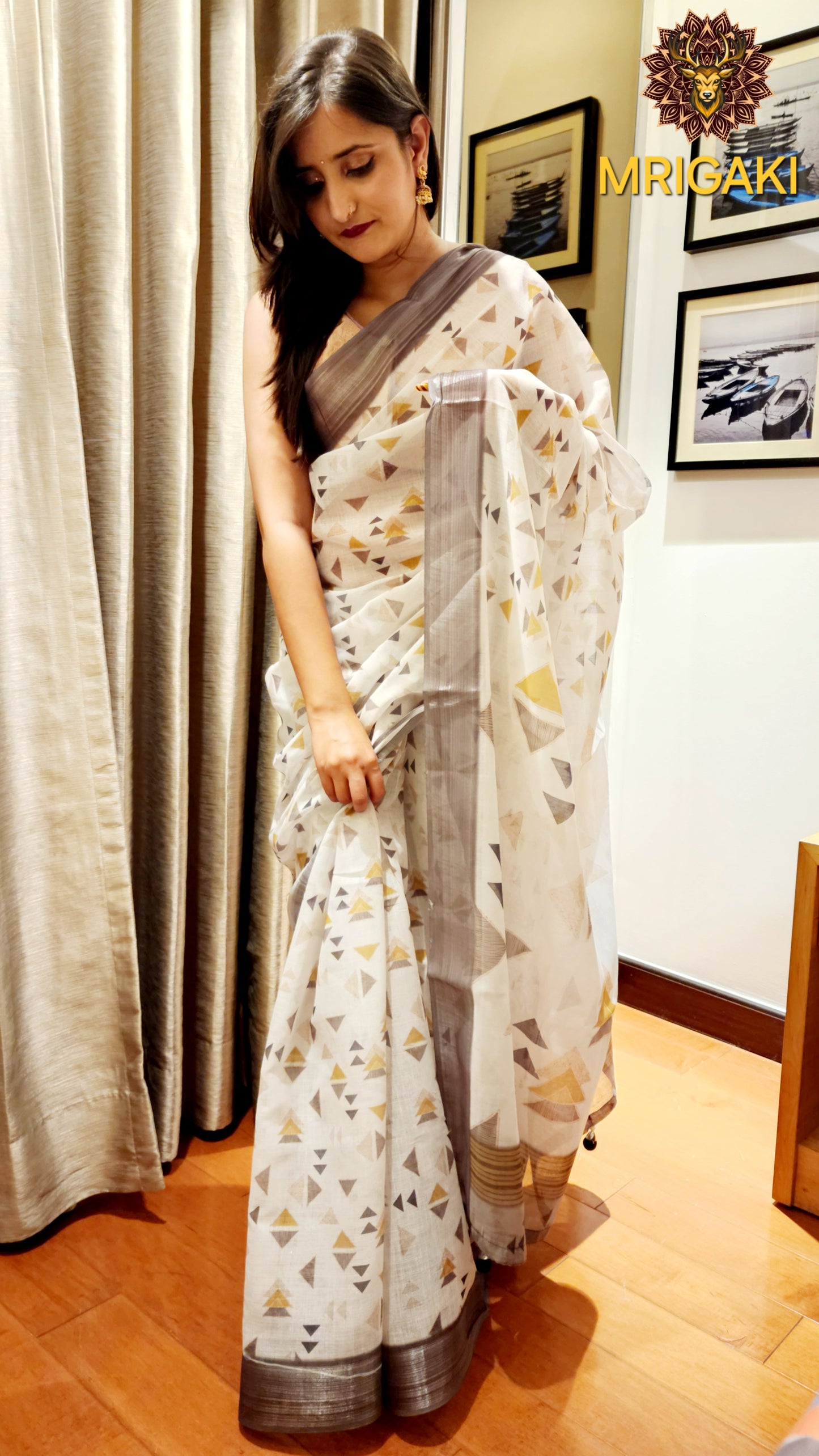 White Base Linen Saree with Triangular Grey digital design all-over, dark grey border with Pom-Pom on Pallu