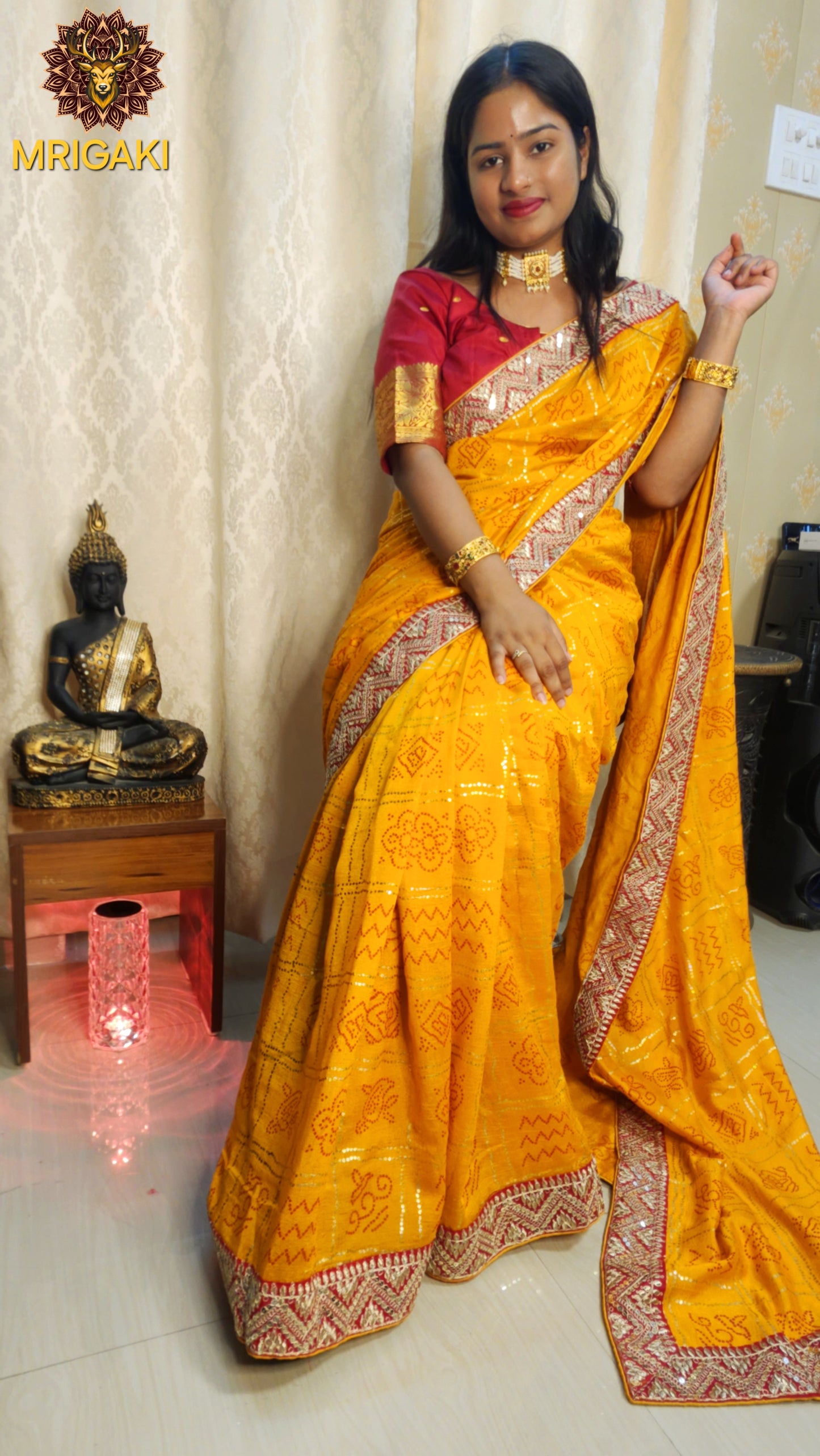 Yellow color Bandhej Saree with contrast Red gotta border & designer unstitched blouse piece