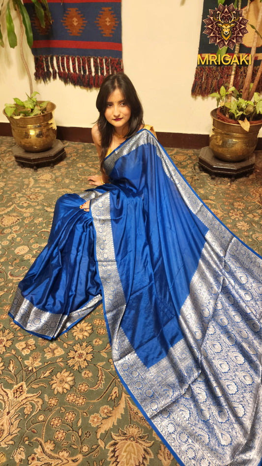Soft Silk Plain Royal Blue color Banarasi Saree with Silver color Zari border & Pallu