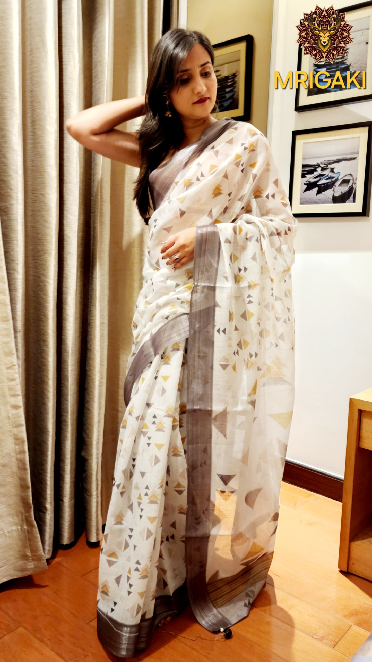 White Base Linen Saree with Triangular Grey digital design all-over, dark grey border with Pom-Pom on Pallu