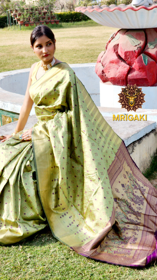 Warm Silk  Saree in Green & Dark Purple contrast with geometrical print all over & Patola Print Pallu