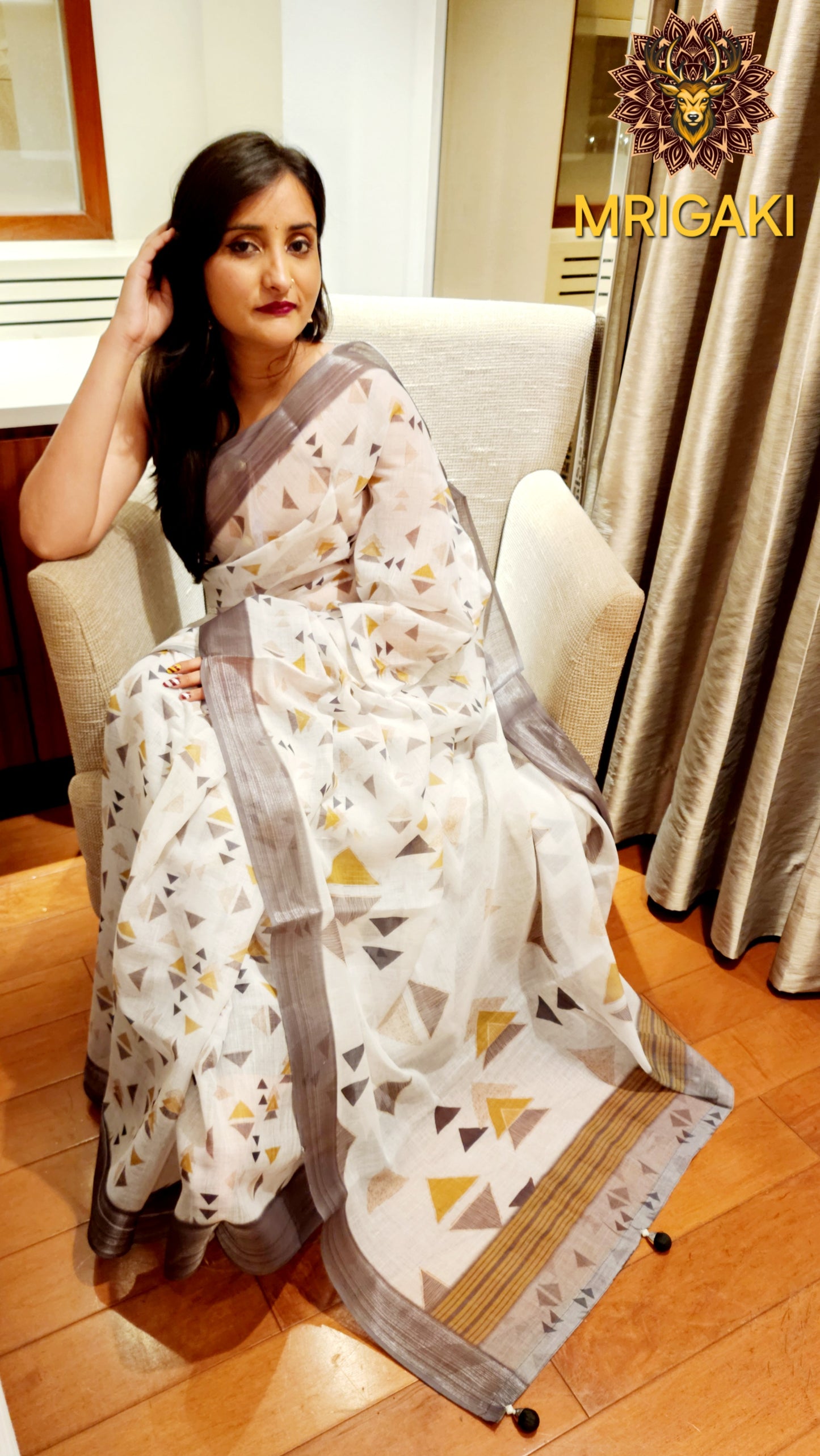 White Base Linen Saree with Triangular Grey digital design all-over, dark grey border with Pom-Pom on Pallu