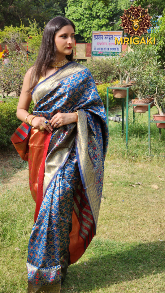 Warm Silk Saree in Dark Blue color with Red contrast, Patola print All over & on Pallu
