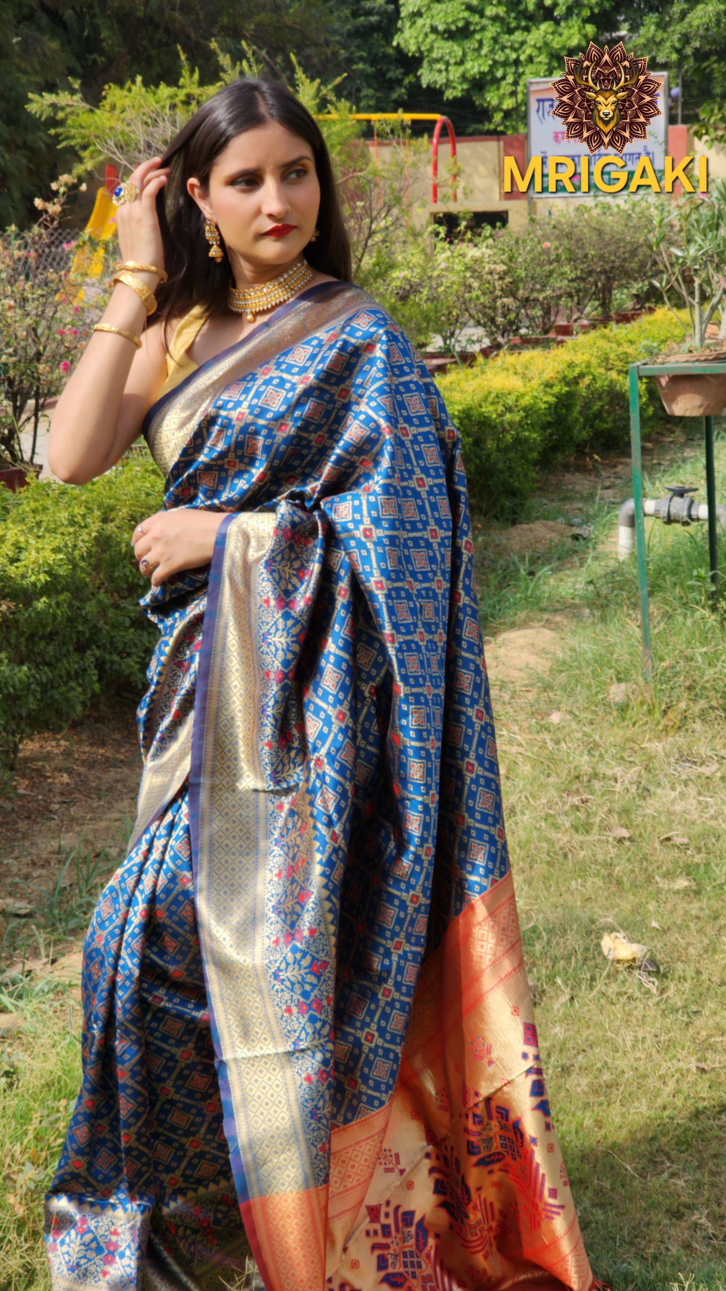 Warm Silk Saree in Dark Blue color with Red contrast, Patola print All over & on Pallu