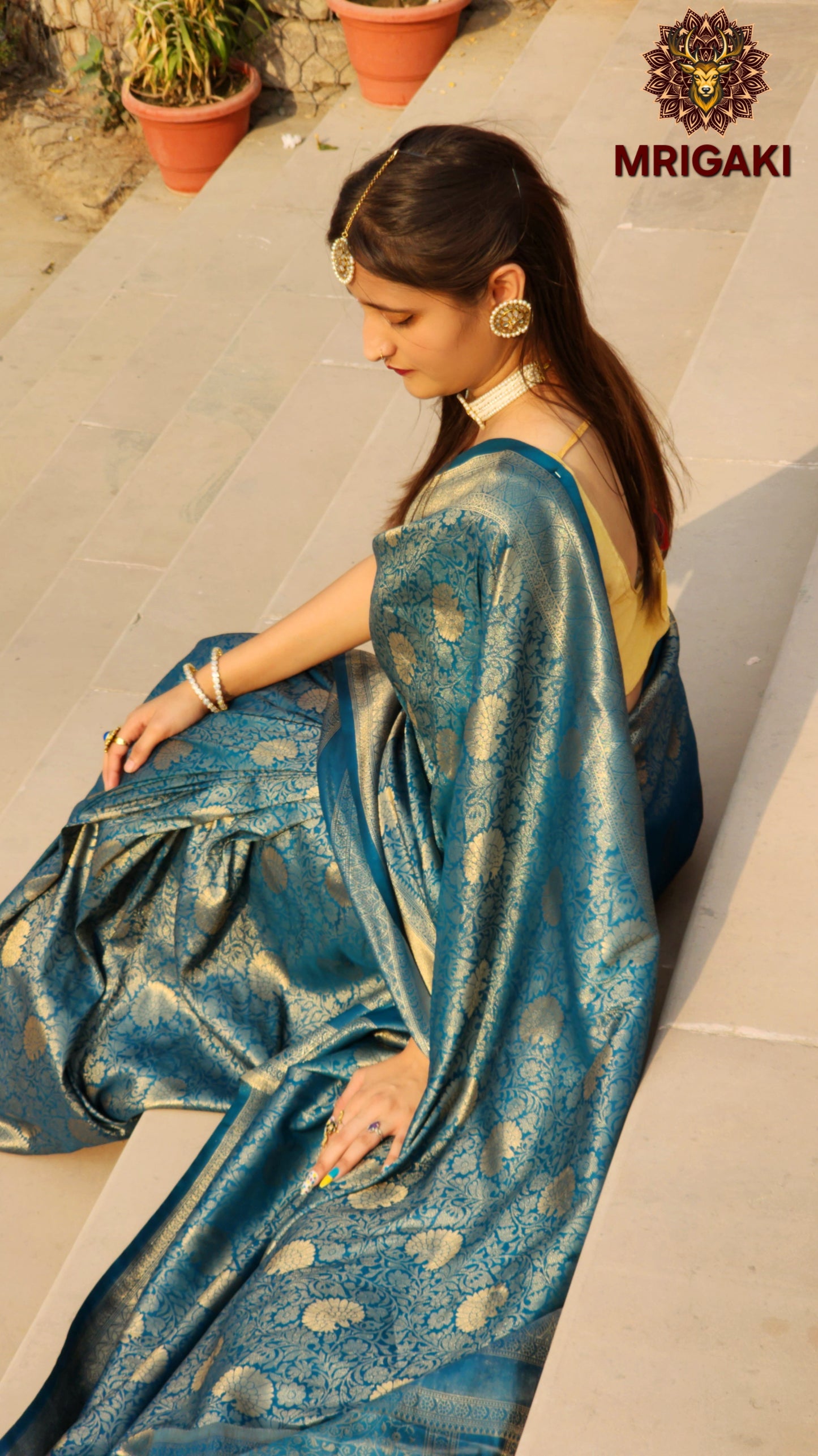 Turquoise Blue Kanjeevaram Silk Saree with Self Design all over & Zari border
